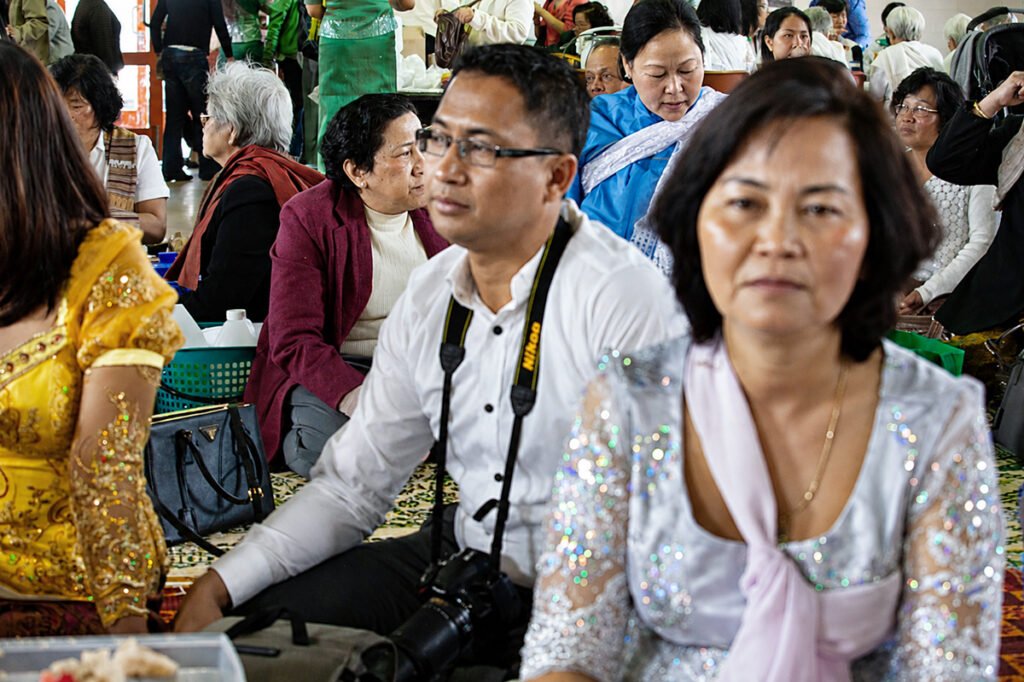 Community members presenting offerings during the Kathina ceremony at Wat Buddharangsi Melbourne