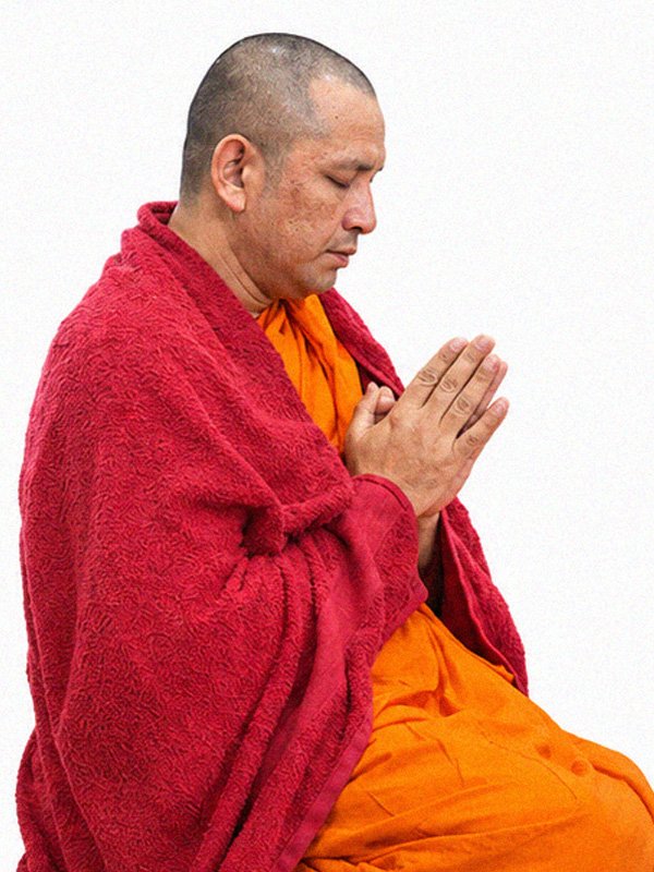 Buddhist monk of Wat Buddharangsi Melbourne seated in meditation