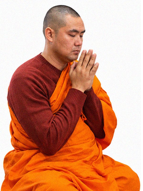 Buddhist monk of Wat Buddharangsi Melbourne seated in meditation