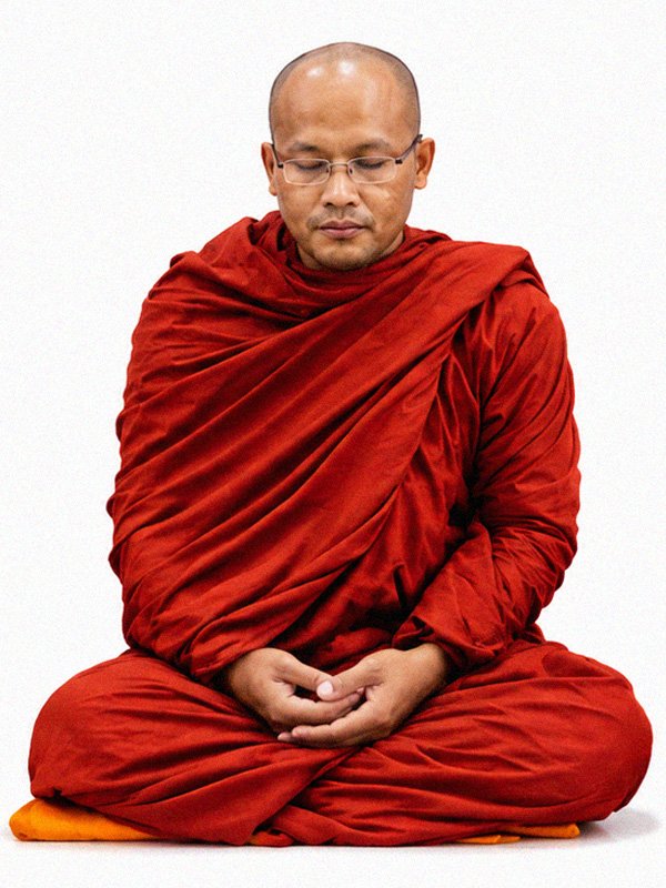 Buddhist monk of Wat Buddharangsi Melbourne seated in meditation