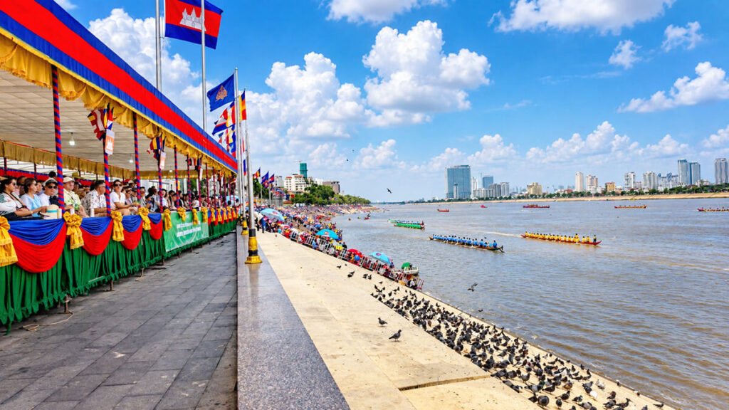 Crowds watching traditional boat races along the Phnom Penh riverside during Bon Om Touk Water Festival